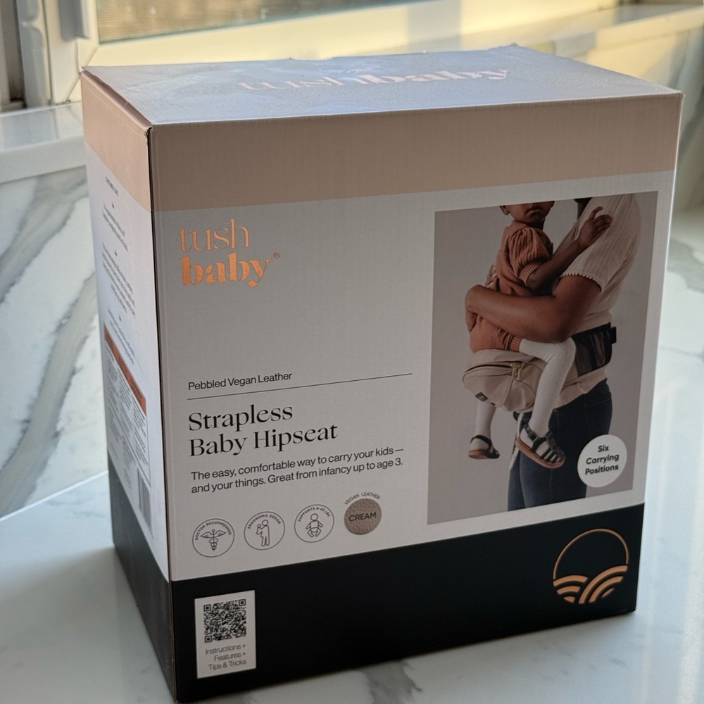 New in Box TushBaby Cream Strapless Baby Hipseat